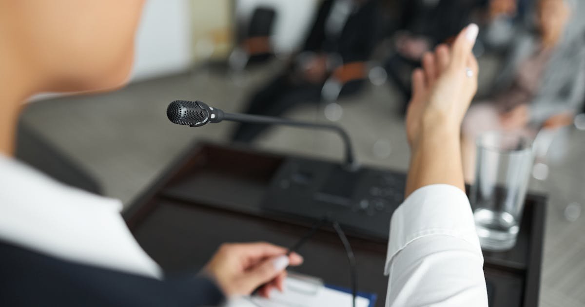 Person speaking at a podium